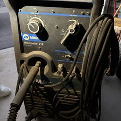 Millermatic 210 MIG welder with wheel