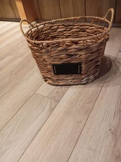 Small rattan basket with handles