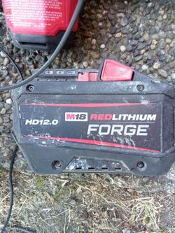 Milwaukee M18 battery and craftsmen saw