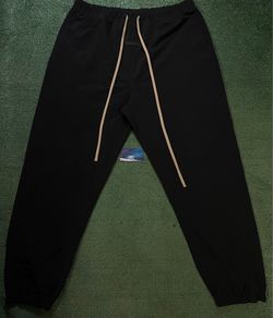 Fear of God Essentials black nylon track pants