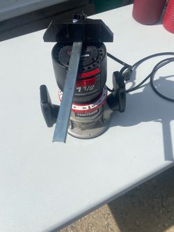 1 1/2 Horsepower Router with built in work light. Great addition. Comes along with box of accessories attachments