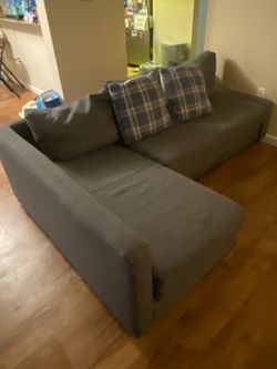 Dining table with chairs and couch