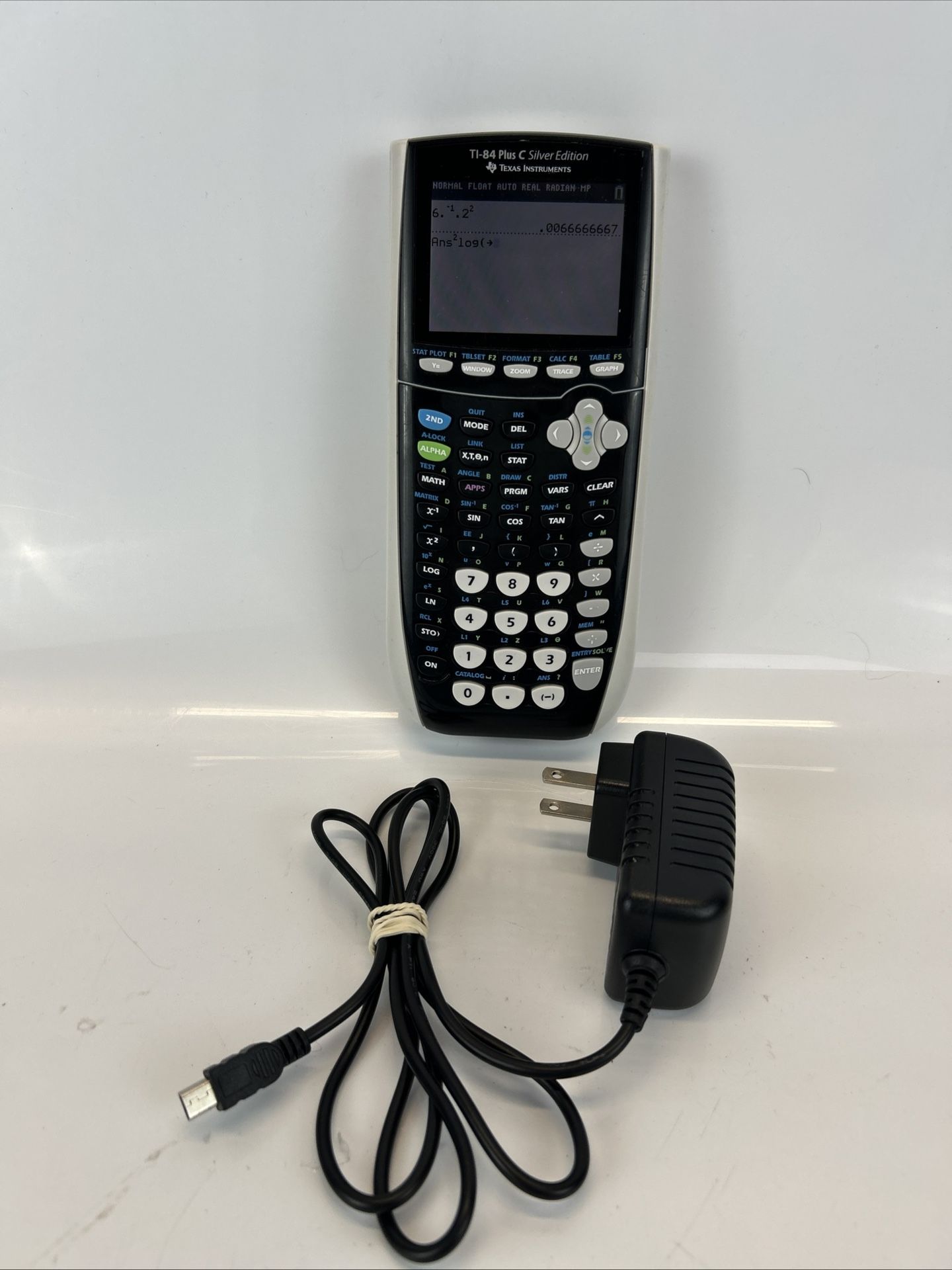 Texas Instruments TI-84 Plus C Silver Edition Graphing Calculator w/Charge Cord