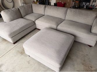 Emerald Home Furnishings 3-seat left chase sectional with Ottoman