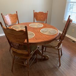 Kitchen Table And Chairs  And Has A Leaf And 2 More Chairs