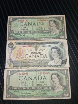 3- $1 old Canadian curreny no longer used in standard market..$6