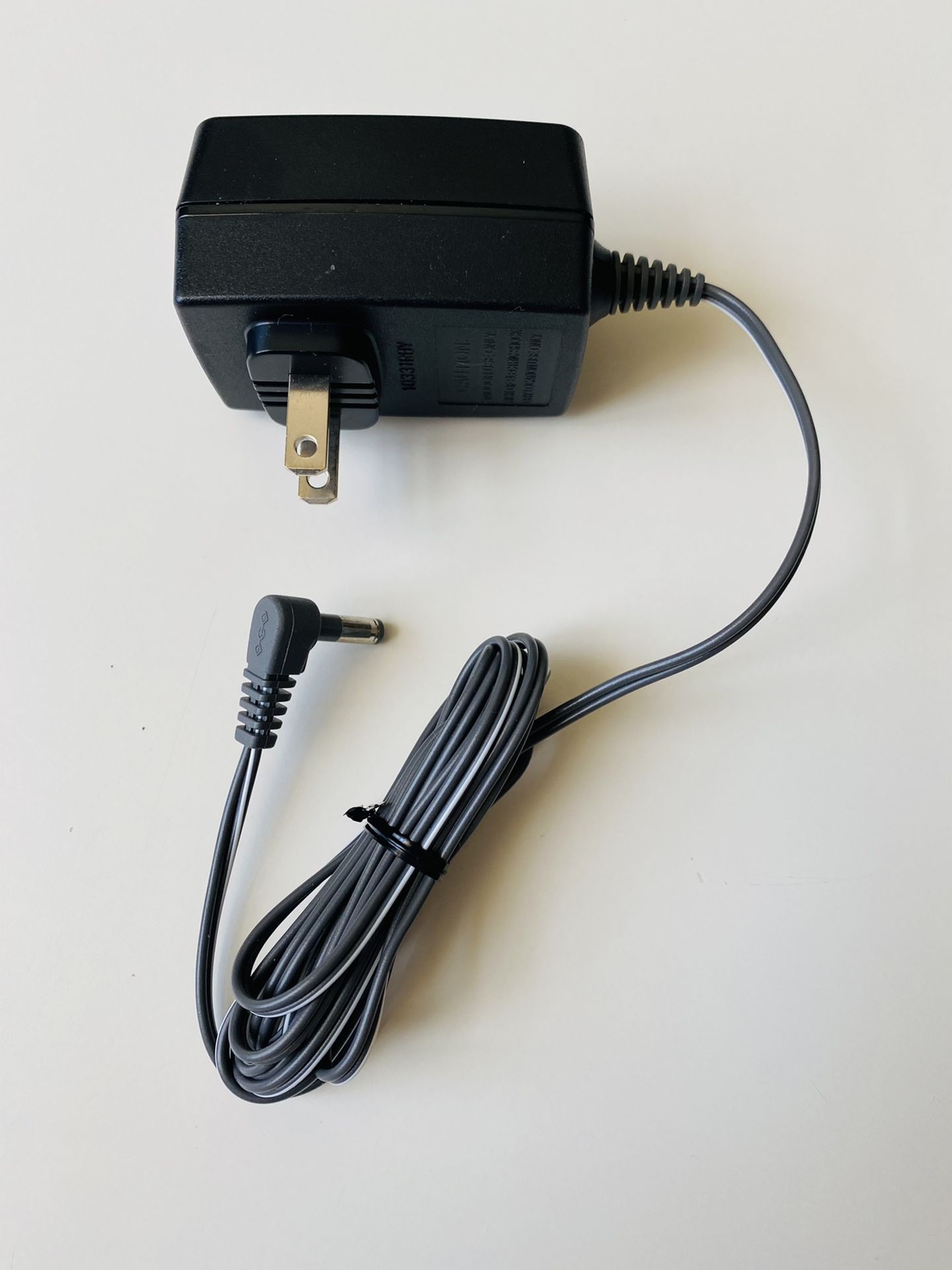 Genuine Panasonic AC Adaptor. PQLV 219. I.T.E. Power Supply. Input: 100-120V. 60Hz. 100 mA. Output: 6.5V. 500 mA. New. Never used.