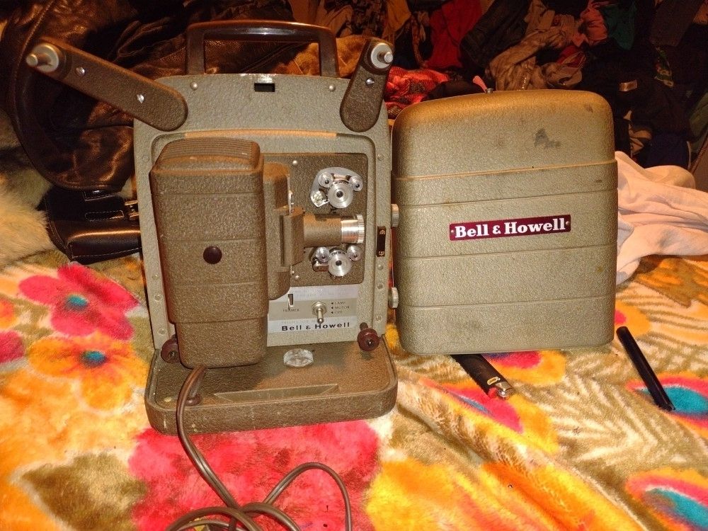 Vintage Projector w Film N Reels