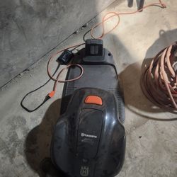 Husqvarna Auto Mower And Charger.