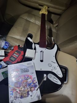Nintendo wii Rockband Guitar with Dongle and Rockband Lego Game 
Working great