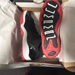 Jordan 11 Low “Bred”