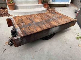 Antique Rustic Wagon Insistían Table With Iron Wheels
