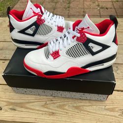 The men's fiery red sneakers and sports shoes are brand new