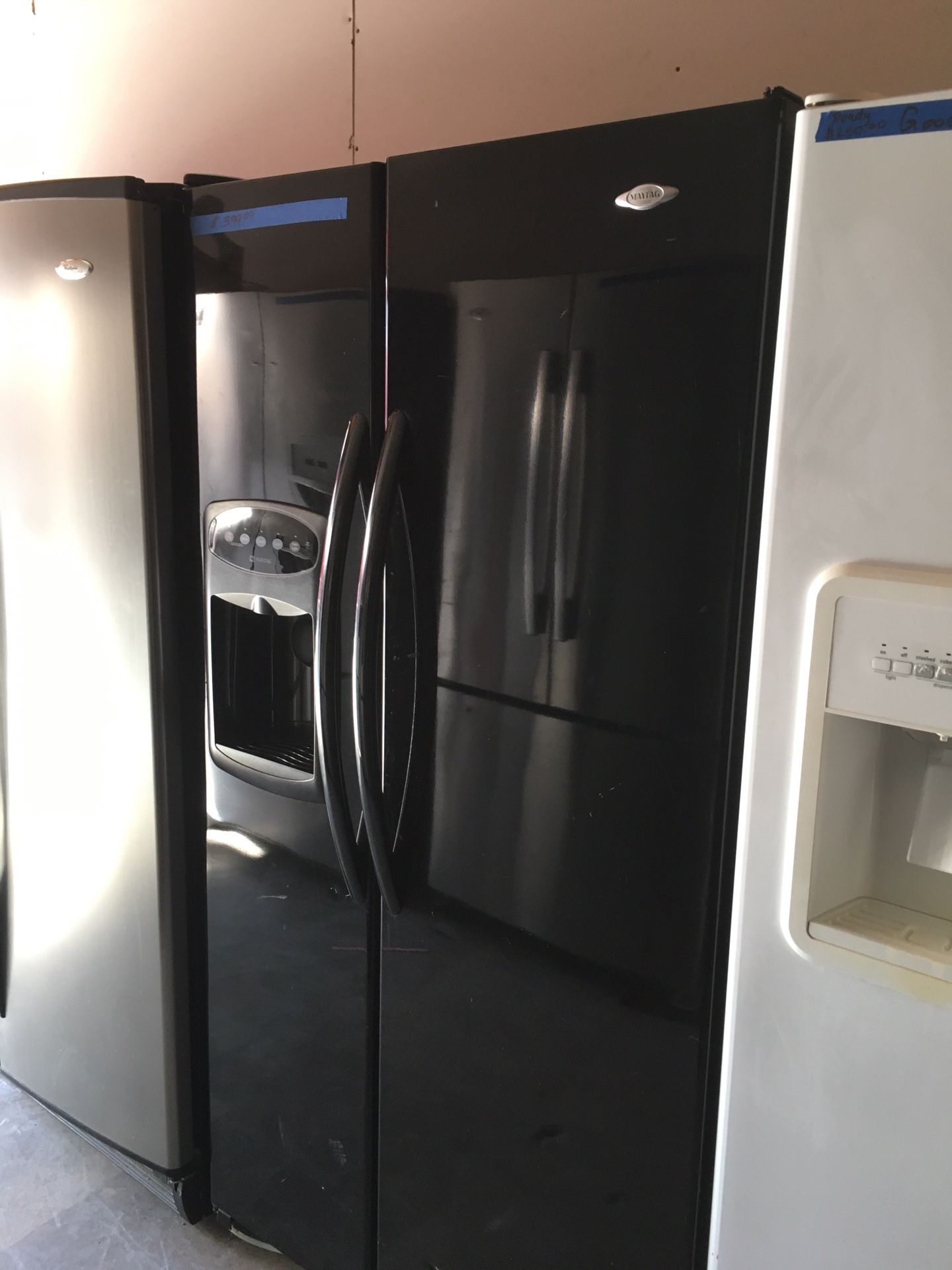 Black double door Maytag refrigerator $399