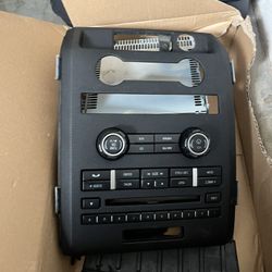2011 Ford F150 OEM Cd Player And Radio With Plastic Mount