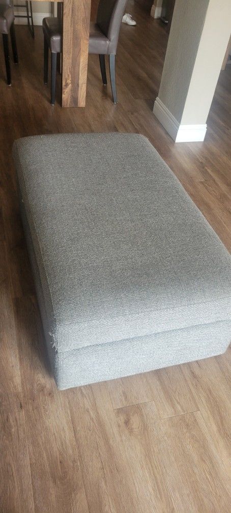 Sleek Comfy Grey Couch With Ottoman