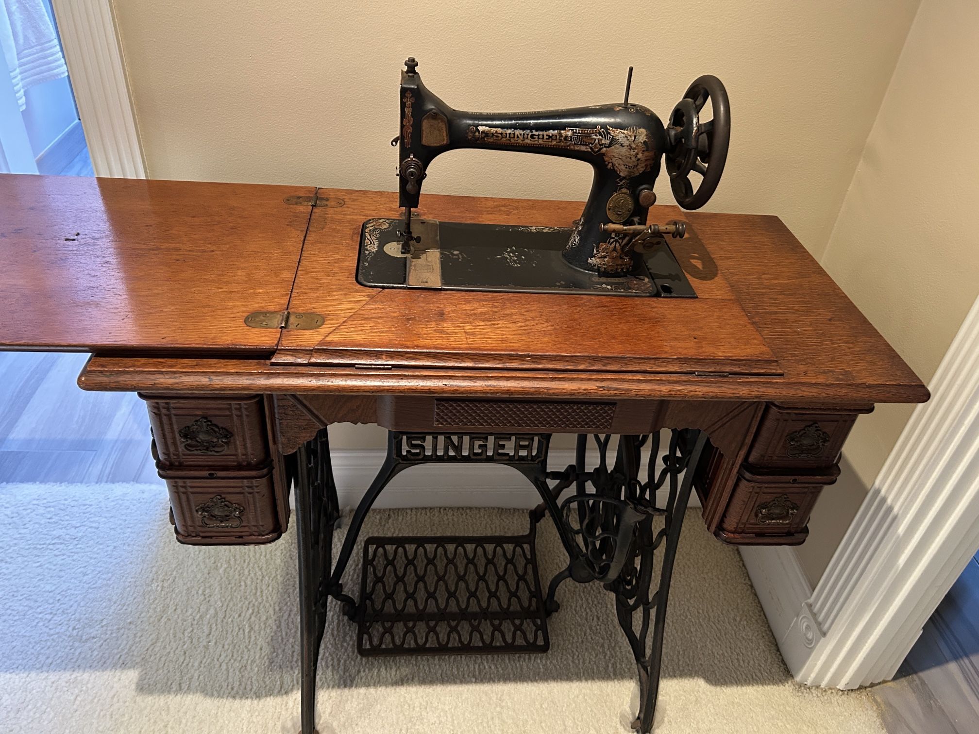 Antique Singer Sewing Machine In Table