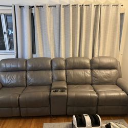 Leather Reclining Sofa With Center Console 