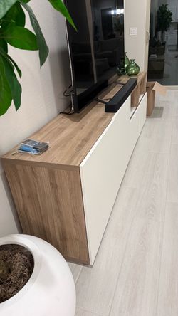Two sides TV console made up of natural wood