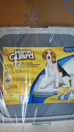 Dog training pad holder