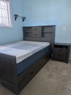 Bed Frame Full size, with storage and a night stand.
