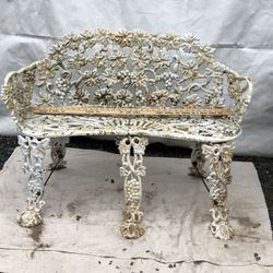 Victorian style antique cast-iron garden bench and chair