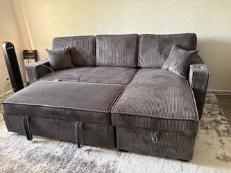 NEW OFFER! Dark Gray Reversible Sectional W/ Cup Holder