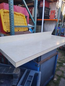 Table top only no lags. It's from compressed wood and formica laminate 60" long 30"wide.