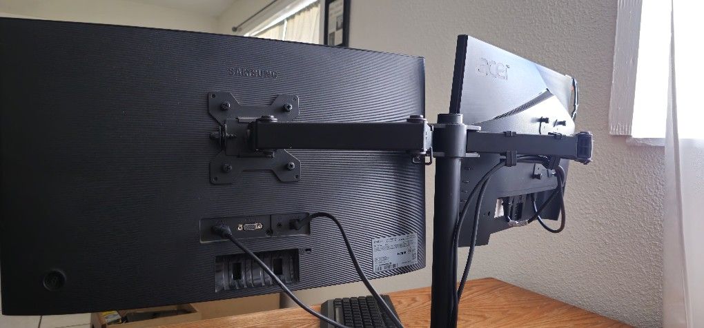 Two Monitors And The Arms Plus Cables