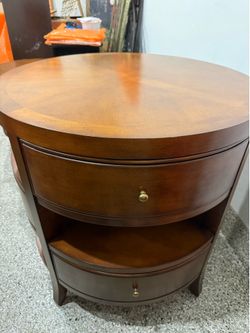 two matching wooden tables