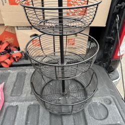 Gourmet Basics by Mikasa Round Wrap 3-Tier Metal Floor Standing Fruit/Home Storage Basket, Easy Assembly, Antique Black Bottom  14” Middle.   12 1/2” 