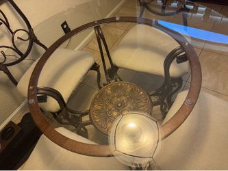 Glass table with 4 chairs