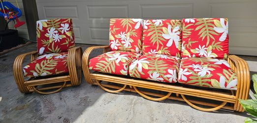 Excellent condition Ratton Sofa and chair set with Floral Hawaiian print cushions.