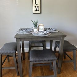 Ashley’s Caitbrook Counter Height Dining Table and 4 Barstools- in EXCELLENT CONDITION (hardly used)