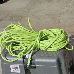 100'Feet Electric Extension Cord In Grate Working Condition, No Cuts 