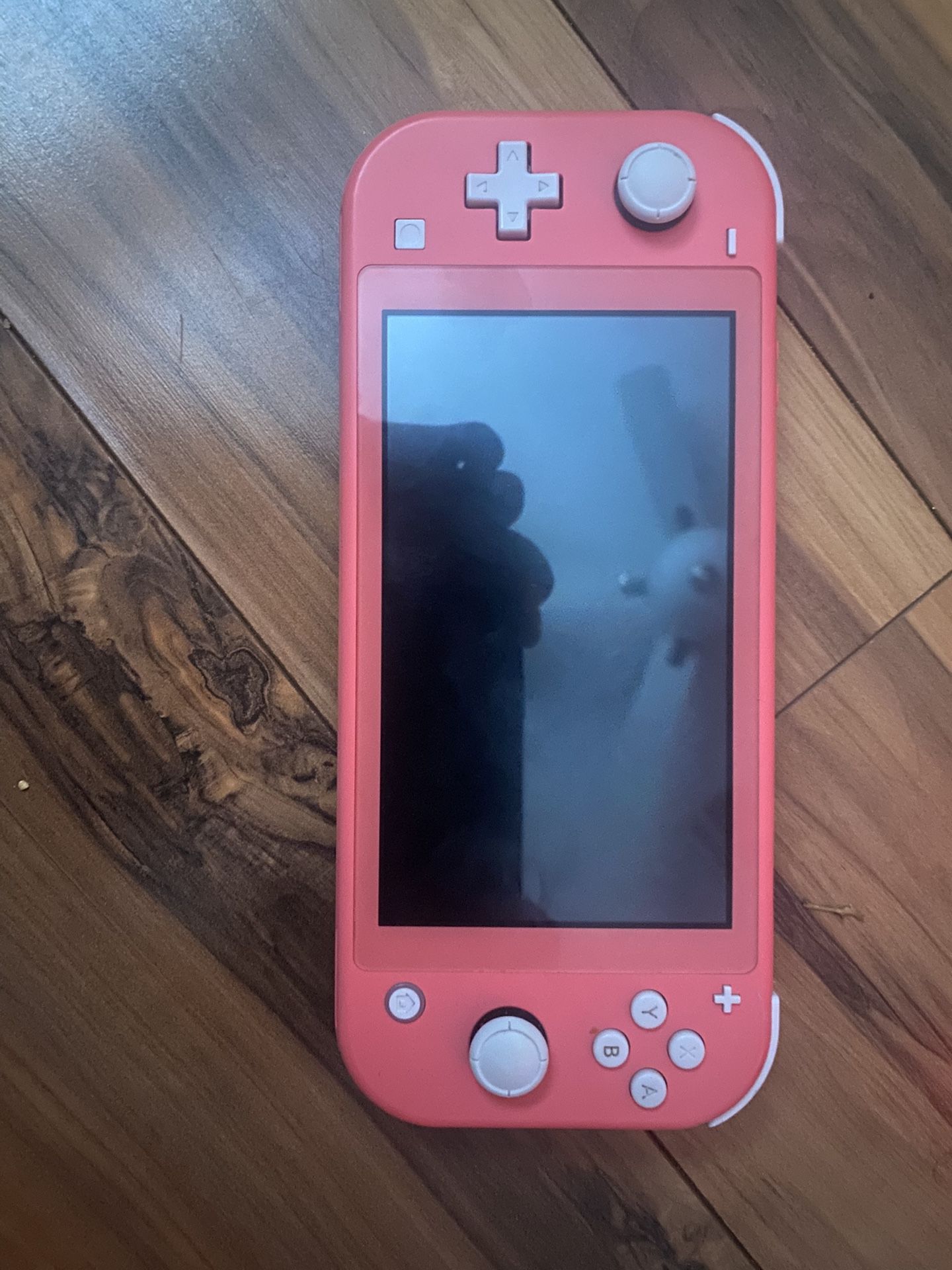 Pink nintendo lite switch