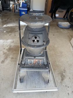 Cast iron wood burning stove.