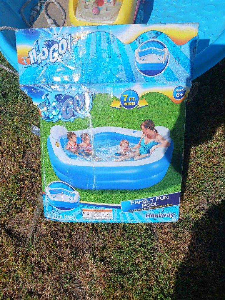 7 Ft Wide By 6 A G E S6 Plus Pool With Little Plastic Pool New Two Slides And A Rocking Swing With Double Swing Sets And A Little Baby Car Push