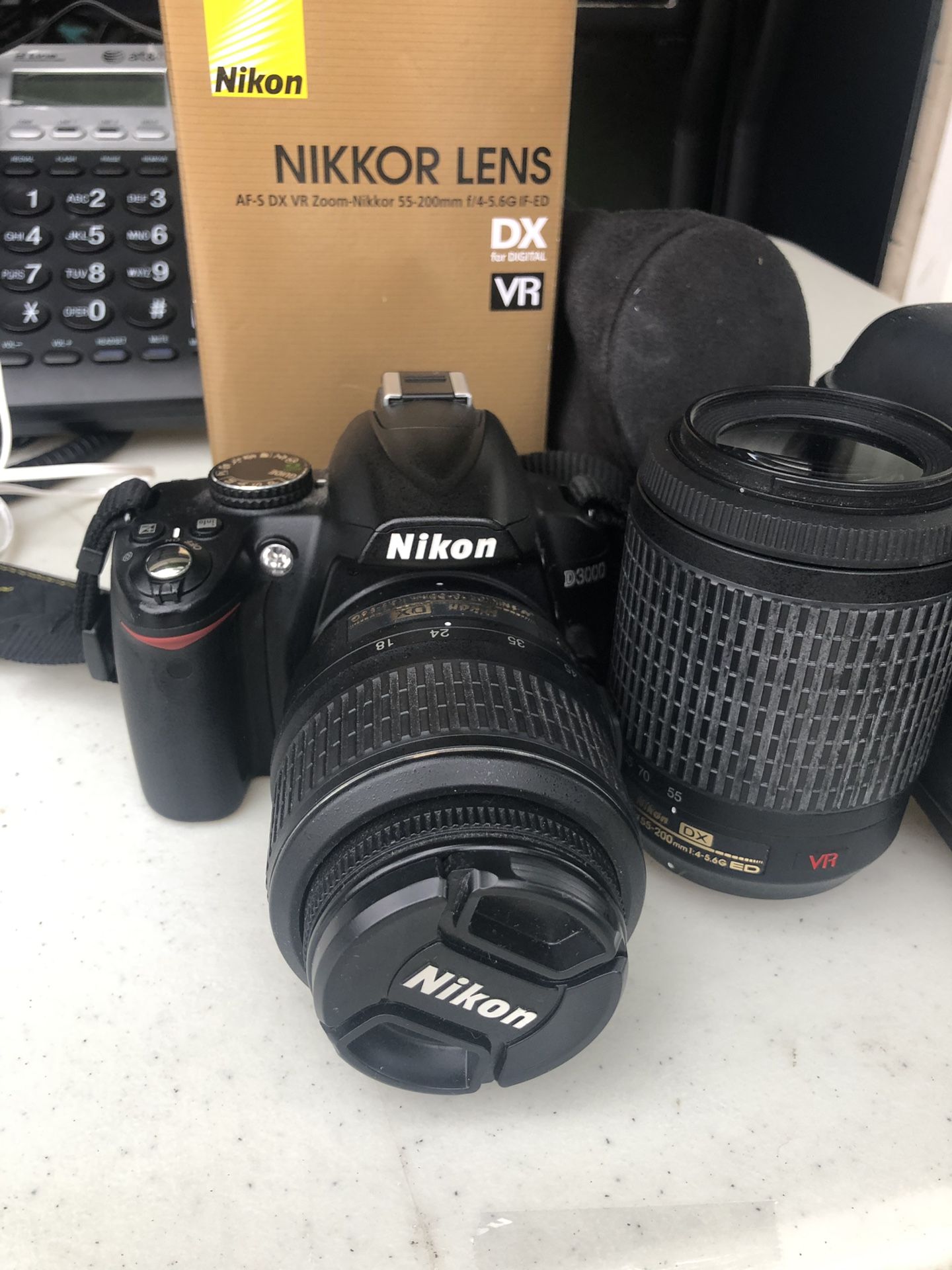 Nikon D3000 with two lenses