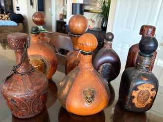Antique leather bottle collection
