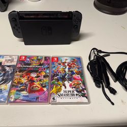 Nintendo Switch + MarioKart 8 Deluxe, SuperSmash Bros Ult, & Bayonetta