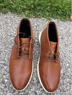 Brand new. Men’s shoes. Cole Haan waterproof Chukka boots. Size is 10.5