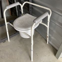 Bedside toilet commode for sick and injured