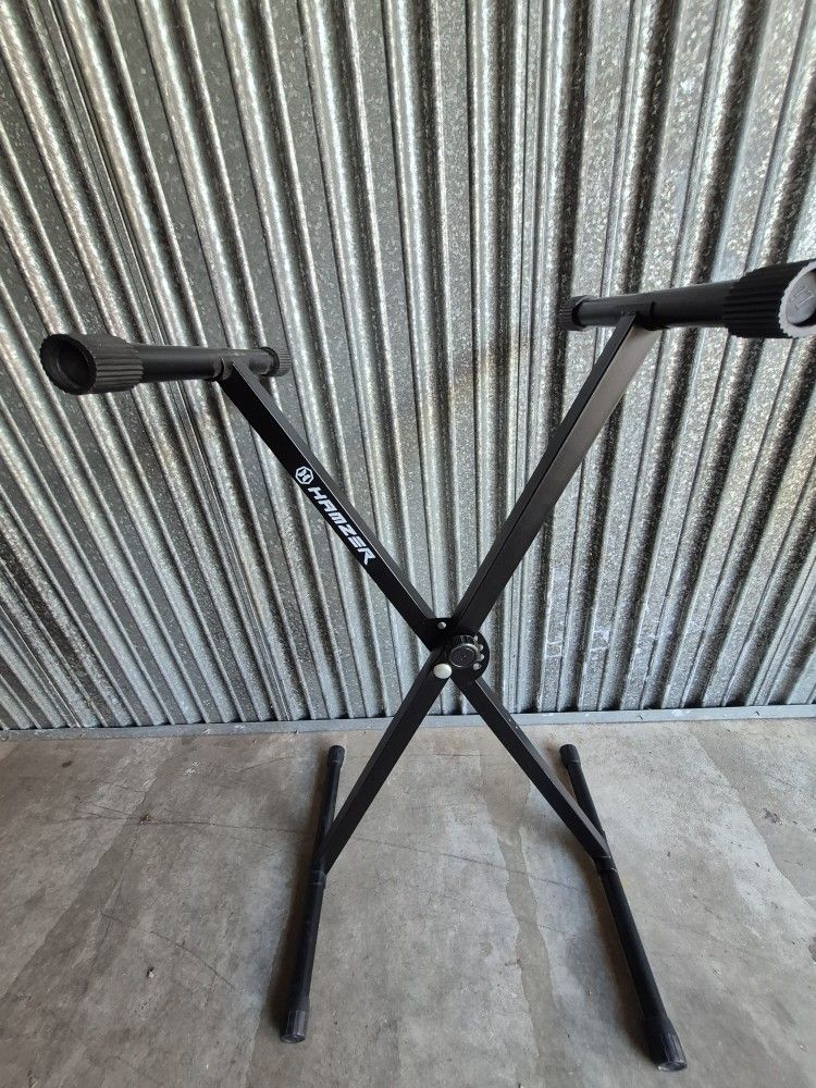 KEYBOARD STAND/ ADJYSTS TO DIFFERENT HEIGHTS & FOLDS UP/ NOT FREE GIVE OFFER