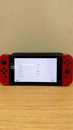 NINTENDO SWITCH W/RED JOY-CONS & CHARGER/CHARGING DOCK