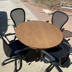 4’ Round Or 6’ 2 Leaf Dinning Table Formica Top Solid Wood Base 4 Hydraulic Adjustable, Rolling Chairs, All In Good Condition $125 Cash 2401 N Euclid 