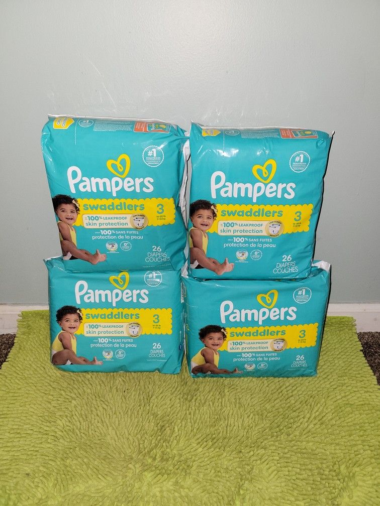 4 Pack 26 Diapers #3 Pampers Swaddlers