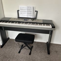 Yamaha keyboard and stool