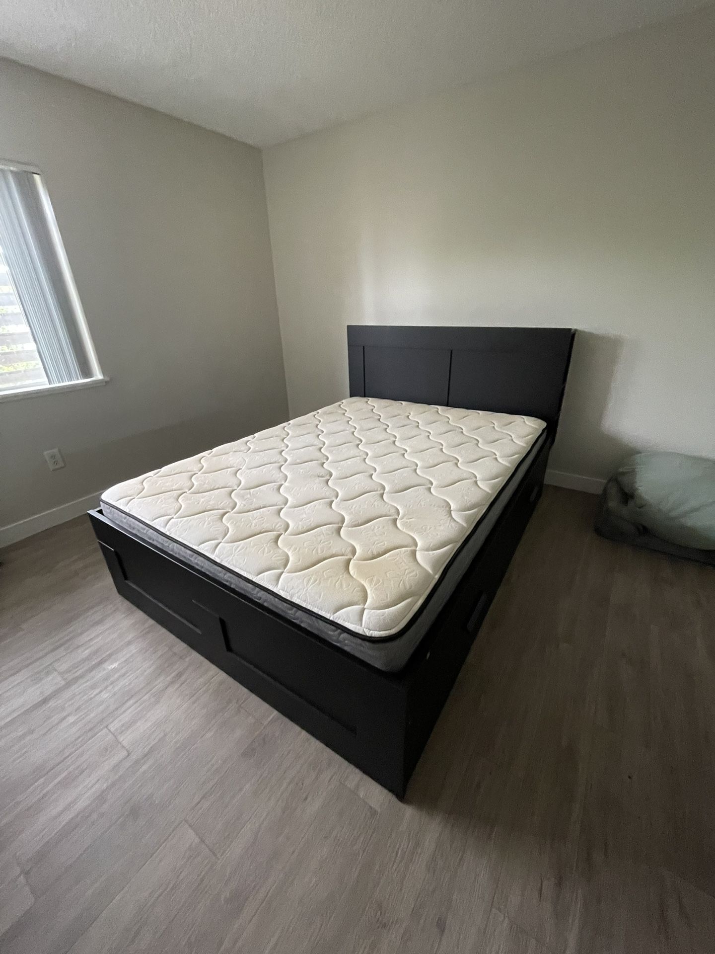 Bed frame with under storage and shelving unit. Queen size mattress included 