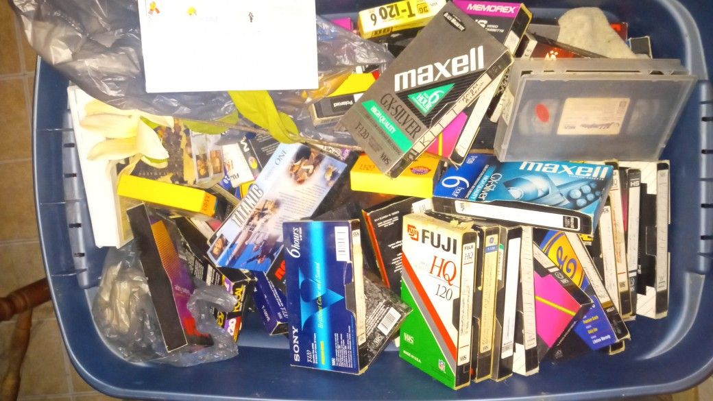 Tub Of Vhs Tapes  Store Bought 3$ , Recorded  3$;A Variety 